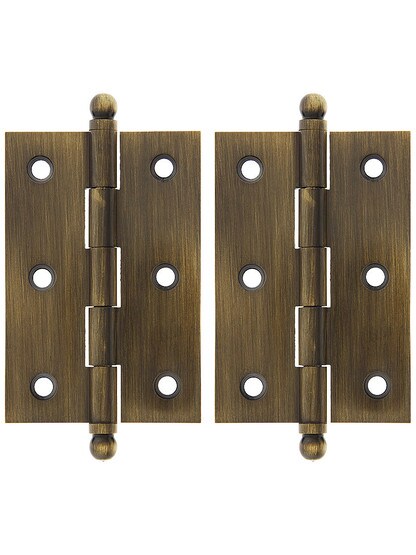 Pair of Solid Brass Ball-Tip Cabinet Hinges - 2 1/2 inch x 1 3/4 inch in Antique Brass.
